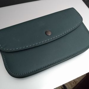 Coach glovetanned leather clutch